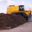 MENART self-propelled windrow turner
